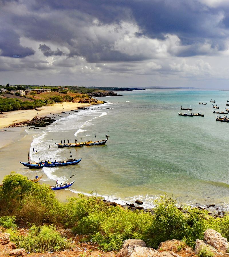 A beautiful cove with a fleet of boats off the coast of Ghana